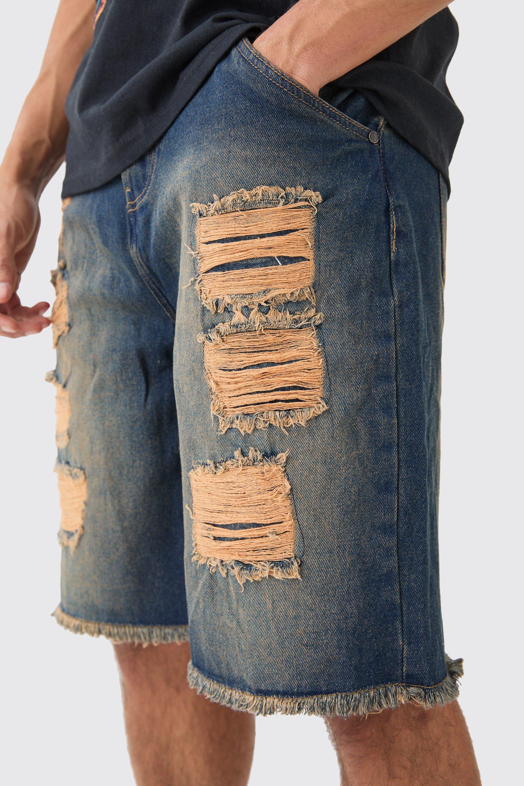 Relaxed Rigid All Over Rips Denim Jorts In Vintage Blue boohoo NZ